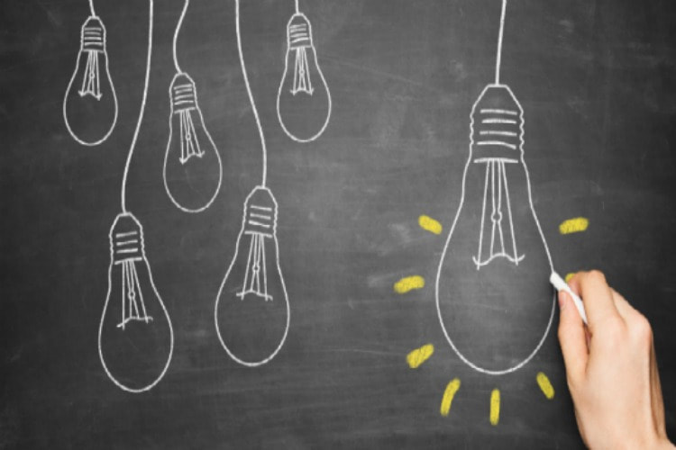Brand Strategy Lightbulbs on Blackboard